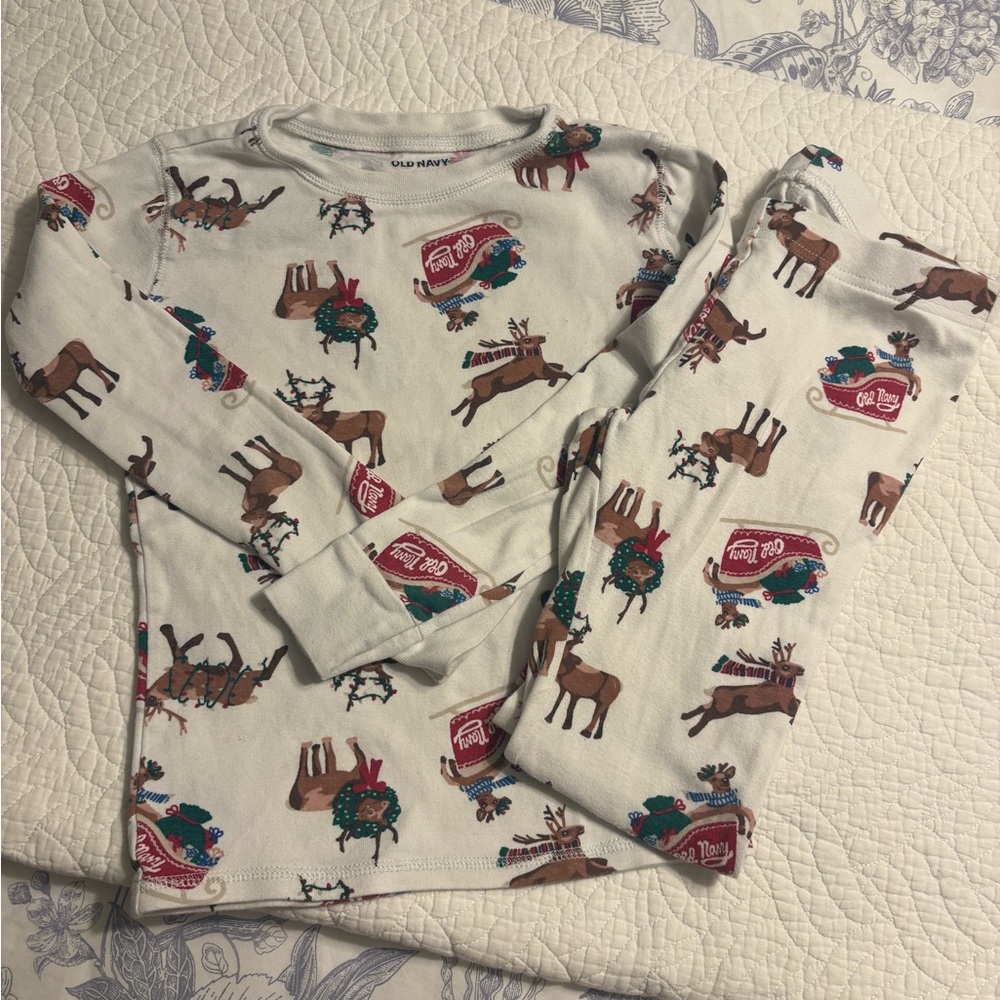 2 pairs of size 8 Old Navy Festive Reindeer Pajama Set (price for pair).
